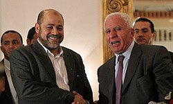 فتح و حماس دوشنبه در قاهره دیدار می‌کنند/ مشعل با کارتر دیدار کرد