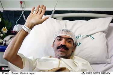 محمد نوروزی عکاس خبری روزنامه کیهان (عکاس جنگ و دفاع مقدس) در بیمارستان خاتم الانبیاء تهران