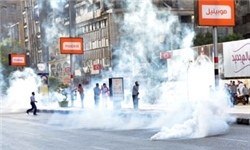 درگیری مخالفان و حامیان اخوان در خیابان مصدق قاهره/ استفاده ارتش از گاز اشک‌آور