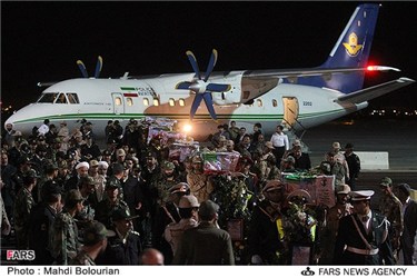 مراسم استقبال رسمی از شهدای حادثه تروریستی سراوان در فرودگاه بین المللی شهید هاشمی نژاد مشهد