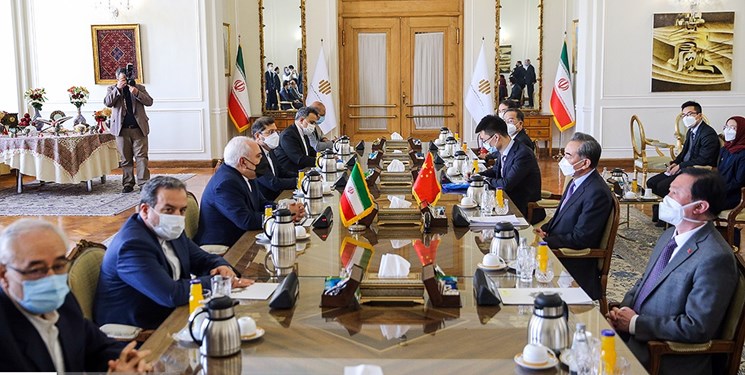 ظریف در دیدار وانگ یی: رفع تحریم‌ها علیه ایران، می‌تواند زمینه اجرای کامل برجام را فراهم کند