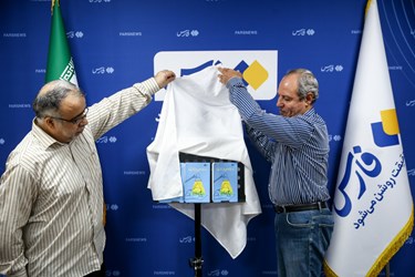 حسن احمدی و حمیدرضا داداشی  در مراسم رونمایی از کتاب «پسری از خیابان اروس»