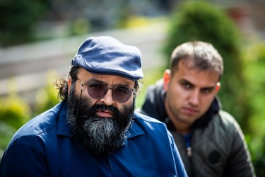 علی محمد مؤدب شاعر در مراسم تشییع پیکر مرحوم  غلامرضا سلیمانی