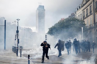 French Police Face Off with Protesters over Pension Reform