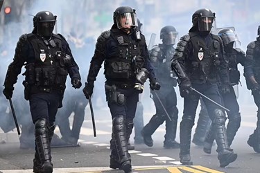 Chaos in France as Police Fire Tear Gas at Protesters in Paris