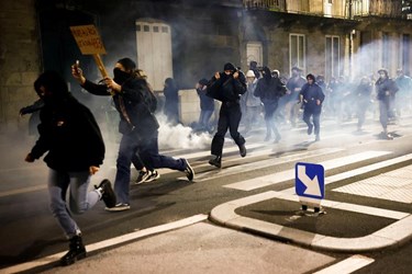 Chaos in France as Police Fire Tear Gas at Protesters in Paris