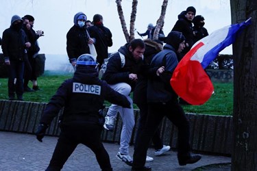 Chaos in France as Police Fire Tear Gas at Protesters in Paris