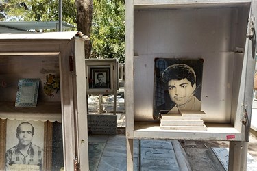 قاب عکس شهیدان در مزار شهدا -قطعه 24 بهشت زهرا(س)