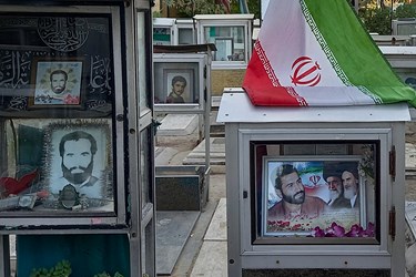 قاب عکس شهیدان در مزار شهدا -قطعه 24 بهشت زهرا(س)