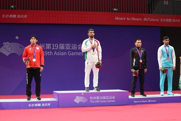 یونس امامی مدال طلا وزن ۷۴کیلوگرم کشتی آزاد را در نوزدهمین دوره بازی‌های آسیایی دریافت کرد
