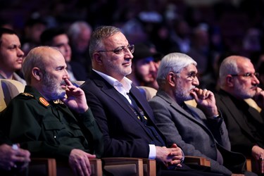 علیرضا زاکانی شهردار تهران و  سردار محمدرضا فلاح‌زاده  جانشین فرمانده نیروی قدس سپاه در سومین همایش یاران سلیمانی