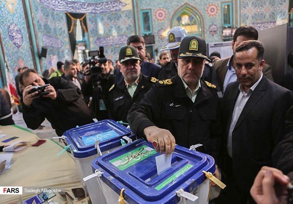 Revolutionary Guards officials cast their votes in Tehran